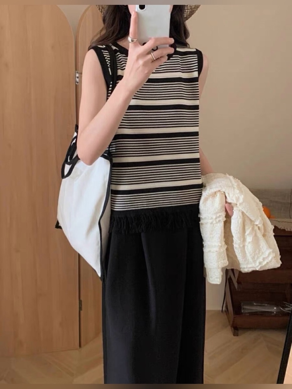 Boutique Sleeveless Black & White Striped Fringe Hem Top